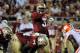 Sept 22, 2012; Tallahassee, Florida, USA; Florida State Seminoles quarterback E.J. Manuel (3) gestures at the line of scrimmage during the first half of the game against the Clemson Tigers at Doak Campbell Stadium. Mandatory Credit: Melina Vastola-US PRESSWIRE