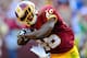 September 23, 2012; Landover, MD, USA; Washington Redskins running back Alfred Morris (46) reacts after scoring a touchdown against the Cincinnati Bengals during the third quarter at FedEx Field. The Bengals defeated the Redskins 38-31. Mandatory Credit: Dale Zanine-US PRESSWIRE
