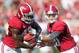 TUSCALOOSA, AL - SEPTEMBER 22: Quarterback AJ McCarron #10 of the Alabama Crimson Tide hands the ball off to running back Eddie Lacy #42 while playing against the Florida Atlantic Owls on September 22, 2012 at Bryant-Denny Stadium in Tuscaloosa, Alabama. Alabama defeated Florida Atlantic 40-7. (Photo by Michael Chang/Getty Images)