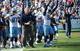 NASHVILLE, TN - SEPTEMBER 23: Head coach Mike Munchak, Karl Klug #97, and Will Witherspoon #92 of the Tennessee Titans and the Titans bench react after the Titans defense held the Detroit Lions on a fourth down at LP Field on September 23, 2012 in Nashville, Tennessee. (Photo by Frederick Breedon/Getty Images)
