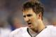 CHARLOTTE, NC - SEPTEMBER 20: Eli Manning #10 of the New York Giants talks to teammates on the sidelines during their game against the Carolina Panthers at Bank of America Stadium on September 20, 2012 in Charlotte, North Carolina. (Photo by Streeter Lecka/Getty Images)