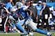 NASHVILLE, TN - SEPTEMBER 23: Ryan Mouton #29 of the Tennessee Titans watches wide receiver Calvin Johnson #81 of the Detroit Lions run after catching a pass at LP Field on September 23, 2012 in Nashville, Tennessee. (Photo by Frederick Breedon/Getty Images)