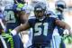 Sep 16, 2012; Seattle, WA, USA; Seattle Seahawks defensive end Bruce Irvin (51) celebrates after sacking Dallas Cowboys quarterback Tony Romo (9) (not pictured during the 2nd half at CenturyLink Field. Seattle defeated Dallas 27-7. Mandatory Credit: Steven Bisig-US PRESSWIRE