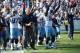 NASHVILLE, TN - SEPTEMBER 23: Head coach Mike Munchak, Karl Klug #97, and Will Witherspoon #92 of the Tennessee Titans and the Titans bench react after the Titans defense held the Detroit Lions on a fourth down at LP Field on September 23, 2012 in Nashville, Tennessee. (Photo by Frederick Breedon/Getty Images)