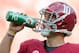 TUSCALOOSA, AL - SEPTEMBER 22: Quarterback AJ McCarron #10 of the Alabama Crimson Tide drinks water in between plays while playing against the Florida Atlantic Owls on September 22, 2012 at Bryant-Denny Stadium in Tuscaloosa, Alabama. Alabama defeated Florida Atlantic 40-7. (Photo by Michael Chang/Getty Images)