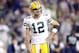 Sept 24, 2012; Seattle, WA, USA; Green Bay Packers quarterback Aaron Rodgers (12) smiles during a timeout against the Seattle Seahawks during the third quarter at CenturyLink Field. Mandatory Credit: Joe Nicholson-US PRESSWIRE