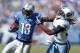 NASHVILLE, TN - SEPTEMBER 23: Nate Burleson #13 of the Detroit Lions runs after a reception against Michael Griffin #33 of the Tennessee Titans during the game at LP Field on September 23, 2012 in Nashville, Tennessee. The Titans won 44-41 in overtime. (Photo by Joe Robbins/Getty Images)