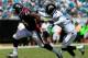 JACKSONVILLE, FL - SEPTEMBER 16: Aaron Ross #31 of the Jacksonville Jaguars attempts to tackle Ben Tate #44 of the Houston Texans during the game at EverBank Field on September 16, 2012 in Jacksonville, Florida. (Photo by Sam Greenwood/Getty Images)