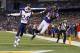 September 23, 2012; Baltimore, MD, USA; Baltimore Ravens wide receiver Torrey Smith (82) catches a pass for a touchdown against New England Patriots cornerback Kyle Arrington (24) in the first half at M&T Bank Stadium. Mandatory Credit: Mitch Stringer-US PRESSWIRE
