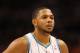 PHOENIX, AZ - DECEMBER 26: Eric Gordon #10 of the New Orleans Hornets during the season openning NBA game against the Phoenix Suns at US Airways Center on December 26, 2011 in Phoenix, Arizona. The Hornets defeated the Suns 85-84. NOTE TO USER: User expressly acknowledges and agrees that, by downloading and or using this photograph, User is consenting to the terms and conditions of the Getty Images License Agreement. (Photo by Christian Petersen/Getty Images)