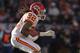 DENVER, CO - JANUARY 01: Running back Dexter McCluster #22 of the Kansas City Chiefs rushes with the ball against the Denver Broncos at Sports Authority Field at Mile High on January 1, 2012 in Denver, Colorado. (Photo by Doug Pensinger/Getty Images)