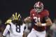 Sep 1, 2012; Arlington, TX, USA; Alabama Crimson Tide tight end Kelly Johnson (31) tries to avoid a tackle by MIchigan Wolverines cornerback T J Ford (8) during the fourth quarter at Cowboys Stadium. Alabama beat Michigan 41-14. Mandatory Credit: Tim Heitman-US PRESSWIRE
