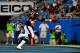 CHARLOTTE, NC - AUGUST 11: Jonathan Grimes #43 of the Houston Texans scores a touchdown against the Carolina Panthers during a preseason game at Bank of America Stadium on August 11, 2012 in Charlotte, North Carolina. The Texans defeated the Panthers, 26-13. (Photo by Grant Halverson/Getty Images)