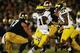 SOUTH BEND, IN - SEPTEMBER 22: Quarterback Denard Robinson #16 of the Michigan Wolverines runs the ball against safety Zeke Motta #17 of the Notre Dame Fighting Irish in the first quarter at Notre Dame Stadium on September 22, 2012 in South Bend, Indiana. (Photo by Jonathan Daniel/Getty Images)