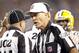Sept 24, 2012; Seattle, WA, USA; Referee Wayne Elliott (28) speaks with field judge Richard Simmons (102) before making a ruling on a call between the Green Bay Packers and Seattle Seahawks during the fourth quarter at CenturyLink Field. Mandatory Credit: Joe Nicholson-US PRESSWIRE