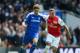 LONDON, ENGLAND - APRIL 21: Fernando Torres of Chelsea is challenged by Alex Oxlade-Chamberlain of Arsenal during the Barclays Premier League match between Arsenal and Chelsea at Emirates Stadium on April 21, 2012 in London, England. (Photo by Mike Hewitt/Getty Images)
