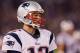 BALTIMORE, MD - SEPTEMBER 23: Quarterback Tom Brady #12 of the New England Patriots looks on during a timeout against the Baltimore Ravens at M&T Bank Stadium on September 23, 2012 in Baltimore, Maryland. (Photo by Rob Carr/Getty Images)