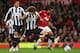 MANCHESTER, ENGLAND - SEPTEMBER 26: Anderson of Manchester United holds off a challenge from Fabricio Coloccini of Newcastle United during the Capital One Cup Third Round match between Manchester United and Newcastle United at Old Trafford on September 26, 2012 in Manchester, England. (Photo by Alex Livesey/Getty Images)