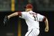 PHOENIX, AZ - JULY 23: Ian Kennedy #31 of the Arizona Diamondbacks delivers a pitch against the Colorado Rockies at Chase Field on July 23, 2012 in Phoenix, Arizona. (Photo by Norm Hall/Getty Images)