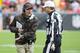 CLEVELAND, OH - SEPTEMBER 23: Head coach Pat Shurmur of the Cleveland Browns argues a call with referee David Scott during the first half against the Buffalo Bills at Cleveland Browns Stadium on September 23, 2012 in Cleveland, Ohio. (Photo by Jason Miller/Getty Images)