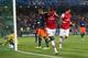 MONTPELLIER, FRANCE - SEPTEMBER 18: Gervinho of Arsenal celebrates scoring his teams second goal during the UEFA Champions League match between Montpellier Herault SC and Arsenal at Stade de la Mosson on September 18, 2012 in Montpellier, France. (Photo by Julian Finney/Getty Images)
