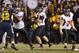 November 1, 2011; Toledo, OH, USA; Northern Illinois Huskies quarterback Chandler Harnish (12) looks to pass against the Toledo Rockets at the Glass Bowl. Mandatory Credit: Rick Osentoski-US PRESSWIRE