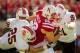 LINCOLN, NE - SEPTEMBER 22: Running back Rex Burkhead #22 of the Nebraska Cornhuskers is surrounded by defensive lineman James Bergren #91, defensive back Tanner Davis #25 and defensive back Cameron Gupton #28 of the Idaho State Bengals during their game at Memorial Stadium on September 22, 2012 in Lincoln, Nebraska. (Photo by Eric Francis/Getty Images)