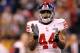 INDIANAPOLIS, IN - FEBRUARY 05: Ahmad Bradshaw #44 of the New York Giants reacts against the New England Patriots during Super Bowl XLVI at Lucas Oil Stadium on February 5, 2012 in Indianapolis, Indiana. (Photo by Jamie Squire/Getty Images)