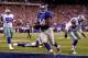 EAST RUTHERFORD, NJ - SEPTEMBER 05: running back Ahmad Bradshaw #44 of the New York Giants scores a touchdown in the third quarter past free safety Gerald Sensabaugh #43 of the Dallas Cowboys during the 2012 NFL season opener at MetLife Stadium on September 5, 2012 in East Rutherford, New Jersey. (Photo by Jeff Zelevansky/Getty Images)