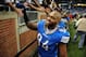 Dec 24, 2011; Detroit, MI, USA; Detroit Lions defensive end Lawrence Jackson (94) celebrates with fans after defeating the San Diego Chargers 38-10 at Ford Field. Mandatory Credit: Andrew Weber-US PRESSWIRE