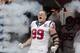 HOUSTON,TX - SEPTEMBER 09: J.J. Watt #99 of the Houston Texans is introduced to the crowd before playing the Miami Dolphins at Reliant Stadium on September 9, 2012 in Houston, Texas. (Photo by Bob Levey/Getty Images)