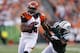 CINCINNATI, OH - AUGUST 10: Jermaine Gresham #84 of the Cincinnati Bengals makes a 19-yard reception against Calvin Pace #97 of the New York Jets during a preseason NFL game at Paul Brown Stadium on August 10, 2012 in Cincinnati, Ohio. (Photo by Joe Robbins/Getty Images)