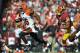 LANDOVER, MD - SEPTEMBER 23: Andrew Hawkins #16 of the Cincinnati Bengals runs the ball in for the winning touchdown against the Washington Redskins at FedExField on September 23, 2012 in Landover, Maryland. The Bengals defeated the Redskins 38-31. (Photo by Larry French/Getty Images)