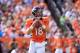 DENVER, CO - SEPTEMBER 23: Quarterback Peyton Manning #18 of the Denver Broncos delivers a pass against the Houston Texans at Sports Authority Field at Mile High on September 23, 2012 in Denver, Colorado. The Texans defeated the Broncos 31-25. (Photo by Doug Pensinger/Getty Images)