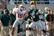 EAST LANSING, MI - SEPTEMBER 29: Devin Smith #15 of the Ohio State Buckeyes can't make a first quarter catch in front of Isaiah Lewis #9 of the Michigan State Spartans at Spartan Stadium on September 29, 2012 in East Lansing, Michigan. (Photo by Gregory Shamus/Getty Images)
