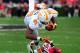 ATHENS, GA - SEPTEMBER 29: Mychal Rivera #81 of the Tennessee Volunteers is upended by Branden Smith #1 of the Georgia Bulldogs at Sanford Stadium on September 29, 2012 in Athens, Georgia. (Photo by Scott Cunningham/Getty Images)