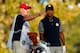 MEDINAH, IL - SEPTEMBER 29: Tiger Woods of the USA chats with his caddie Joe LaCava during day two of the Afternoon Four-Ball Matches for The 39th Ryder Cup at Medinah Country Club on September 29, 2012 in Medinah, Illinois. (Photo by Jamie Squire/Getty Images)
