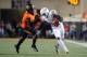 Sept 29, 2012; Stillwater, OK, USA; Texas Longhorns receiver Marquise Goodwin (84) runs after a catch while being defended by Oklahoma State Cowboys cornerback Justin Gilbert (4) during the first half at Boone Pickens Stadium. Mandatory Credit: Mark D. Smith-US PRESSWIRE