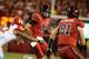 LINCOLN, NE - SEPTEMBER 29: Quarterback Taylor Martinez #3 of the Nebraska Cornhuskers tries to elude defensive back Dezmen Southward #12 of the Wisconsin Badgers during their game at Memorial Stadium on September 29, 2012 in Lincoln, Nebraska. (Photo by Eric Francis/Getty Images)