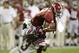 September 29, 2012; Tuscaloosa, AL, USA; Alabama Crimson Tide wide receiver Amari Cooper (9) tries to escape the tackle of Mississippi Rebels defensive back Charles Sawyer (3) during the second quarter at Bryant Denny Stadium. Mandatory Credit: John David Mercer-US PRESSWIRE