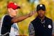 MEDINAH, IL - SEPTEMBER 29: Tiger Woods of the USA chats with his caddie Joe LaCava during day two of the Afternoon Four-Ball Matches for The 39th Ryder Cup at Medinah Country Club on September 29, 2012 in Medinah, Illinois. (Photo by Jamie Squire/Getty Images)