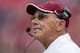 FAYETTEVILLE, AR - SEPTEMBER 15: Head Coach John L. Smith of the Arkansas Razorbacks watches on the sidelines during a game against the Alabama Crimson Tide at Razorback Stadium on September 15, 2012 in Fayetteville, Arkansas. The Crimson Tide defeated the Razorbacks 52-0. (Photo by Wesley Hitt/Getty Images)