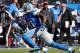 NASHVILLE, TN - SEPTEMBER 23: Ryan Mouton #29 of the Tennessee Titans watches wide receiver Calvin Johnson #81 of the Detroit Lions run after catching a pass at LP Field on September 23, 2012 in Nashville, Tennessee. (Photo by Frederick Breedon/Getty Images)