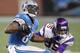 DETROIT, MI - DECEMBER 11: Calvin Johnson #81 of the Detroit Lions spins out of a tackle after a fourth quarter catch by Marcus Sherels #35 of the Minnesota Vikings at Ford Field on December 11, 2011 in Detroit, Michigan. (Photo by Gregory Shamus/Getty Images)