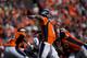 DENVER, CO - SEPTEMBER 23: Quarterback Peyton Manning #18 of the Denver Broncos throws a pass against the Houston Texans at Sports Authority Field at Mile High on September 23, 2012 in Denver, Colorado. (Photo by Justin Edmonds/Getty Images)
