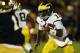 SOUTH BEND, IN - SEPTEMBER 22: Quarterback Denard Robinson #16 of the Michigan Wolverines runs for a first down in the third quarter against the Notre Dame Fighting Irish at Notre Dame Stadium on September 22, 2012 in South Bend, Indiana. (Photo by Jonathan Daniel/Getty Images)