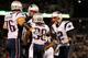 BALTIMORE, MD - SEPTEMBER 23: Tom Brady #12 (R) of the New England Patriots celebrates with Brandon Bolden #38 and Sebastian Vollmer #76 after Bolden scored a 2-yard rushing touchdown in the first quarter against the Baltimore Ravens at M&T Bank Stadium on September 23, 2012 in Baltimore, Maryland. (Photo by Rob Carr/Getty Images)