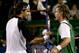 HOUSTON - NOVEMBER 21: Roger Federer of Switzerland shakes hands with Lleyton Hewitt of Australia after the men's final of the Tennis Masters Cup November 21, 2004 at the Westside Tennis Club in Houston, Texas. Federer won the match with the score of 6-3, 6-2. (Photo by Clive Brunskill/Getty Images)