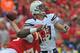 KANSAS CITY, MO - SEPTEMBER 30: Quarterback Philip Rivers #17 of the San Diego Chargers throws a pass down field against the Kansas City Chiefs during the first quarter on September 30, 2012 at Arrowhead Stadium in Kansas City, Missouri. (Photo by Peter Aiken/Getty Images)