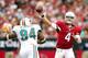 GLENDALE, AZ - SEPTEMBER 30: Quarterback Kevin Kolb #4 of the Arizona Cardinals throws a pass over defensive tackle Randy Starks #94 of the Miami Dolphins during the NFL game at the University of Phoenix Stadium on September 30, 2012 in Glendale, Arizona. The Carindals defeated the Dolphins 24-21 in overtime. (Photo by Christian Petersen/Getty Images)